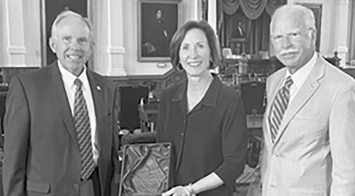 Sen. Lois Kolkhorst accepts the Champion of Transparency Award from Donnis Baggett and Mike Hodges of Texas Press Association. CONTRIBUTED PHOTO