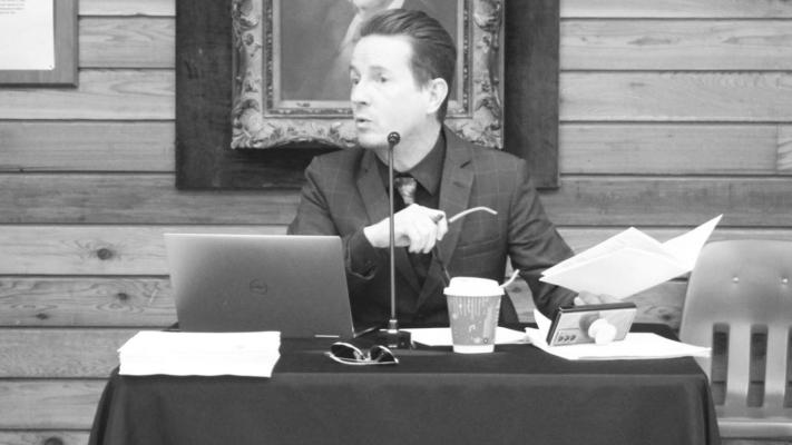 HANS LAMMEMAN Sealy’s City Attorney and Chief Legal Advisor Tim Kirwin read from the current Home Rule Charter while explaining the CRC’s suggested changes to the city council.