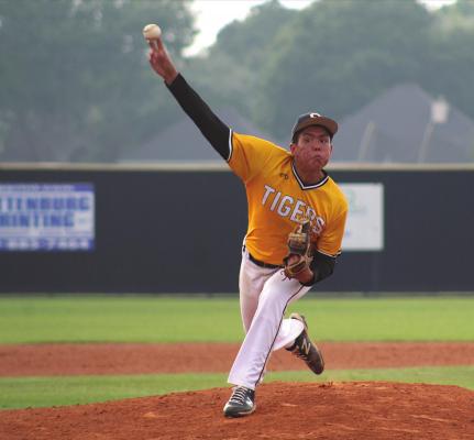 Sealy junior Jose Bludau fires a pitch during the Tigers’ playoff warmup game against Fort Bend Kempner at Aubrey “Mutt” Stuessel Stadium Monday evening. PHOTOS BY COLE McNANNA
