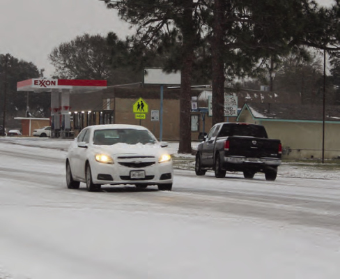 A blanket of snow fell over Sealy and Austin County in January of last year, leaving residents trying out their driving skills throughout the county. SEALY NEWS FILE PHOTO