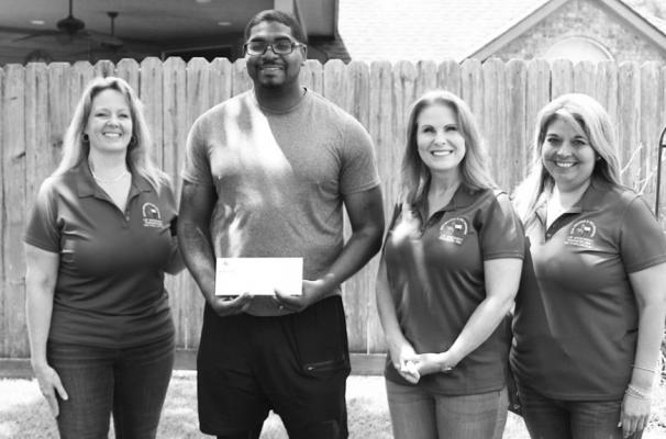 Harris County Sheriff’s Office Deputy Troy Vaughn was one of five deputies who received donations from the Texas Association of First Responders June 19 in Houston. He is pictured with TAFR’s Sarah Holland, Karen Lopez and Amy Sustaita.