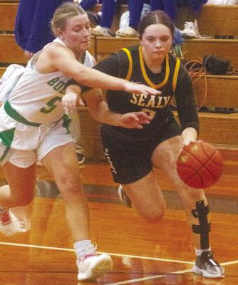 Sealy senior Grace Eschenburg fires up a three during last Thursday’s contest against Boling. PHOTO BY JIMMY GALVAN