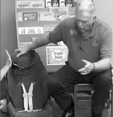 Gary Pflughaupt educates Sealy ISD students on Seat Belt Safety during a presentation at Sealy Elementary School. CONTRIBUTED PHOTO