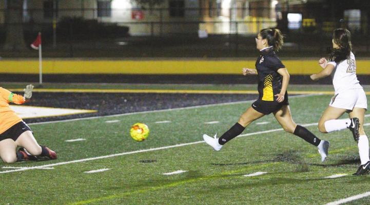 Lady Tiger junior Destinee Castillo buries a shot in the back of the net and scored Sealy’s first goal of the season in last Tuesday’s 8-1 loss to the Giddings Buffaloes at T.J. Mills Stadium. Photos by Cole McNanna