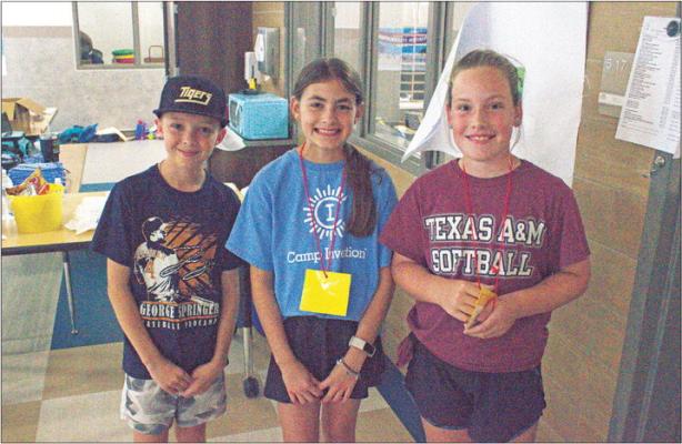 Students are all smiles as they talk about how much they love Camp Invention. Left to right Jackson Brothers, Channing Whatley and Heidi Hemphill. PHOTOS BY ABENEZER YONAS