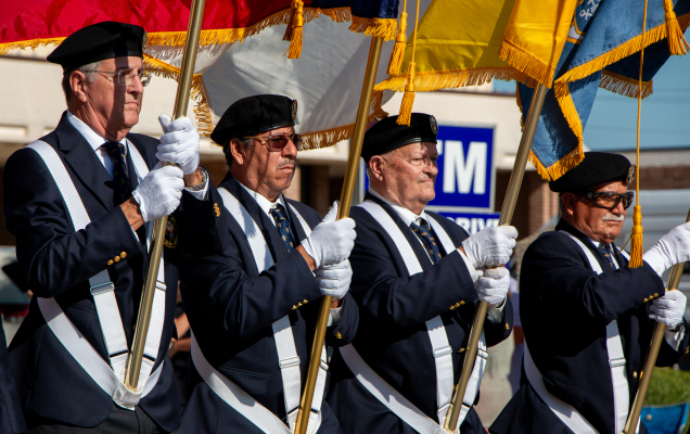 Colorguard Knights Mark Nastoupil, Raul Rosas, James Toman and Abraham Carrillo from the Knights of Columbus Father Crann Council #3313 in Sealy carry flags to mark the start of the Austin County Fair opening parade, Thursday, Oct. 9, through Bellville.  Sealy News | Allison Drinnon 