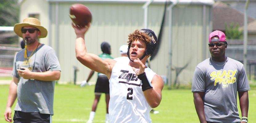 Sealy quarterback D’vonne Hmielewski lifts a pass during the Tigers’ 7-on-7 contest against the Taylor Mustangs June 9 at James E. Taylor High School. Hmielewski was named the preseason offensive MVP for District 12 by Dave Campbell’s Texas Football Magazine. COLE McNANNA