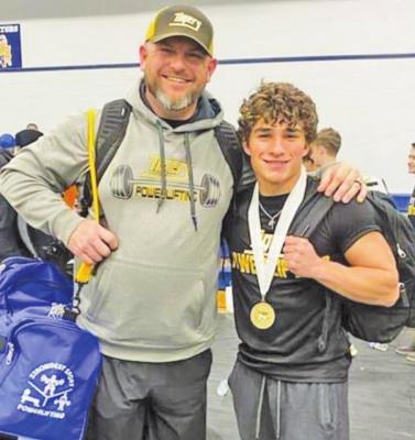 Jeremiah Metzgar Jr. punched his ticket to the state powerlifting meet with a first-place finish in the 148-pound weight class at the THSPA Region 4 Division 2 Championship March 12 in Saratoga. He is pictured with Sealy Head Powerlifting Coach Jimmie Osborne. CONTRIBUTED PHOTO