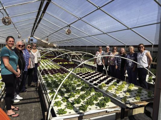 Pictured left to right are Carrie Grissom, Fred Zimmerman, Barney Zimmerman, Doris Glenewinkel, Shirley Beum, Danita Schovajsa, Veronica Ashorn, Jo Ann Reichle, Jessie Kokemor, Knellen Quinteros, Phyllis Weiss.