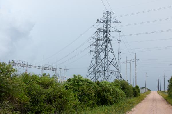 A power station reaches over Substation Road on a stormy afternoon, Monday, June 30, 2025, in Austin County, Texas. Sealy News | Allison Drinnon
