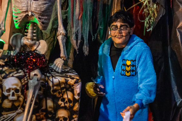 Lexus Chavarría dashes out of a haunted house during Boo Bash, Friday, Oct. 31, in Sealy.