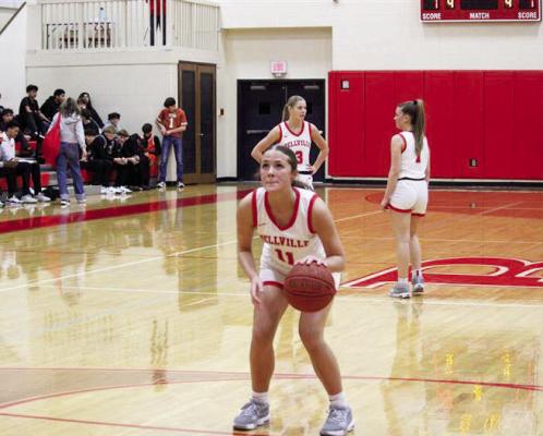 Tyker Scheerer shooting and making a free throw against Smithville.