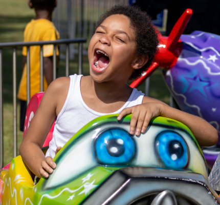 Legend Andrus can hardly contain his excitement as he enjoys a carnival ride Saturday, June 27, at the All for One Festival in Sealy. PHOTOS BY SEALY NEWS | ALESIA WOOLRIDGE