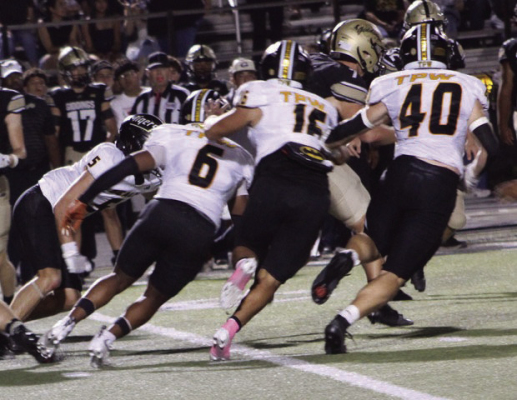 Sealy defenders Beau Finley, 5, Javier Grant, 6, Brady Cranfill, 15, and Colton Gilbert, 40, are in hot pursuit of a Giddings ball carrier. Sealy limited the Buffaloes to eight first downs and 161 total yards in the 56-7 win.