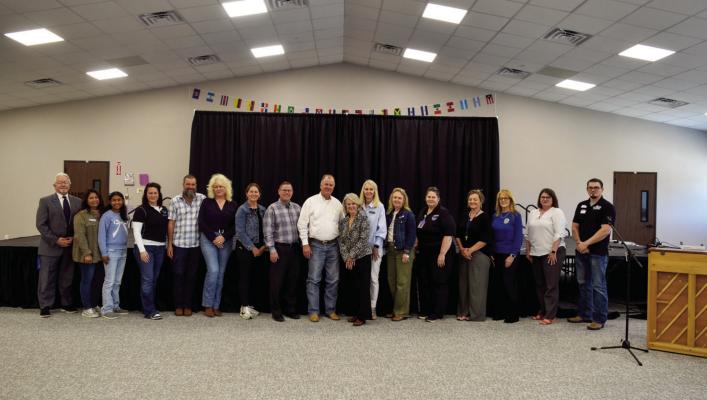 Faith Academy held a dedication for its building recently. Staff and friends gathered for the ceremony held at the campus. COURTESY PHOTO
