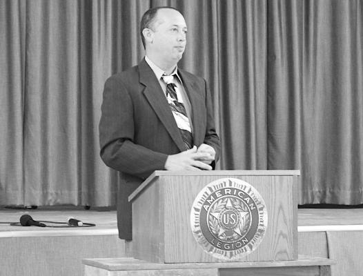 Austin County Judge Tim Lapham speaks at the governmental luncheon hosted by the Sealy Chamber of Commerce June 15 at the Sealy American Legion Hall. AMANDA LUKSHA