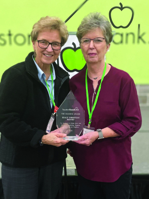 Sue Kristynik, director of pantry operations, and Patsy Tomasek, director of administration, accepted the Houston Food Bank’s Bandini Award. This award was created in memory of the founder of the Houston Food Bank in 1982. The recipient is chosen because they have gone above and beyond in connecting, engaging, and impacting its neighbors. COURTESY PHOTOS
