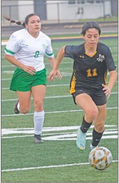Sealy’s Julietta Villagomez dribbles the ball upfield during a district contest. Sealy is set to open its bi-district round of playoff play this week.