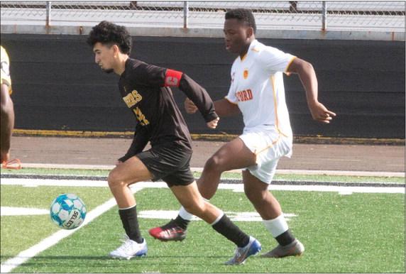 Sealy senior Amador Lopez works the ball up the field during an early game this season. PHOTO BY JIMMY GALVAN