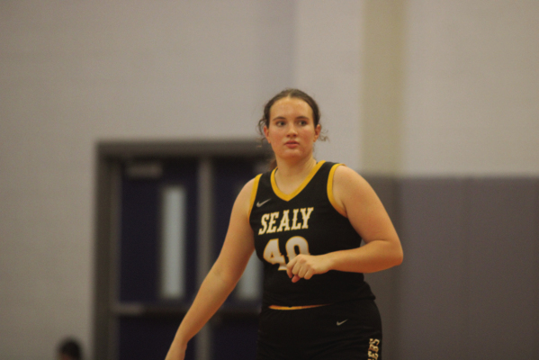 Sydney Petrash carries the ball up the court for the Lady Tigers. SEALY NEWS | EVAN HALE