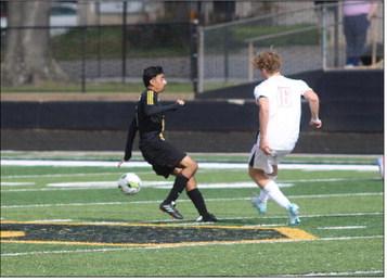 Juan Arriaga breaks up a pass forcing another turnover against St. Thomas.