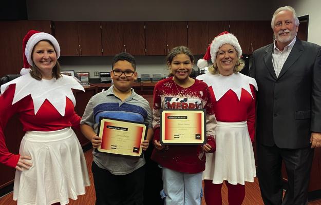 Brazos ISD recognized Brazos Elementary School students, Joshua Ortega and Taiyah Hatton, at the December regular board meeting. BES Principal, Kim Etheridge, shared that these young students are smart, positive, kind and display amazing Little Cougar qualities. Pictured, from left to right, are Stephanie Snedaker, BES Assistant Principal, Joshua Ortega, Taiyah Hatton, Kimberly Etheridge, BES Principal, Dave Plymale, Superintendent Courtesy photo
