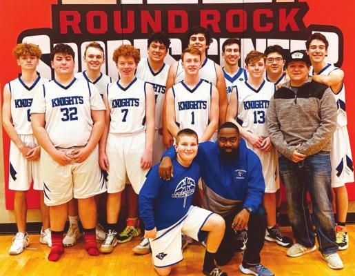 The Faith Academy Knight basketball team wrapped up its season in Round Rock at the TAIAO Tournament in February. Pictured in the back row from the left are John Poorman, Travis Woodley, Nathan Figueroa, Noah Figueroa, Mauricio Cano, Ethan McMakin and Jonah Taake. In the front row are Neil Johnston, Dylan Callihan, Tristen Plumb, Everett Yates and Manager Caden Swierkowski. Kneeling in front are Riley Heyman and Head Coach Joe Riley. CONTRIBUTED PHOTO