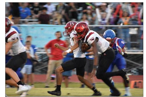 Brazos sophomore quarterback Jarvse Dickerson looks for running room during last Friday’s contest with Nixon-Smiley. COURTESY PHOTO