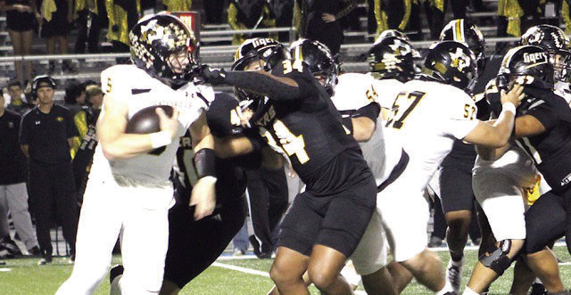Sealy defenders had their hands full against Gatesville’s power-running attack early in the game. But were able to adjust and held the Hornets to one touchdown and only 9 first downs. In the photo Isaiah Dukes-Self and Colton Gilbert, 40, corral Gatesville’s Eli Phillips. Sealy won the game 37-6.