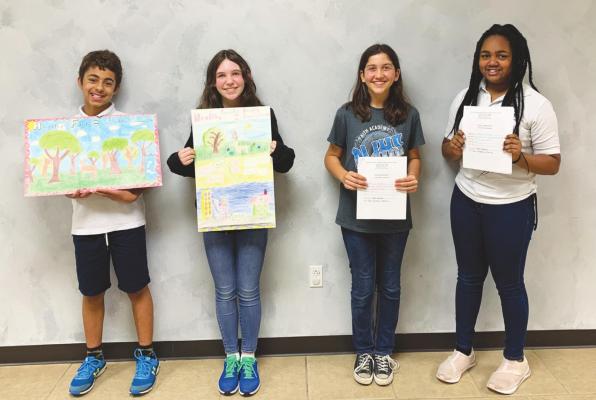 Winners of the AC Soil and Water Conservation District’s Poster and Essay Contests included Joshua Hardy (3rd place, 6th Grade Poster Contest), Caitlyn Brookes (1st place, 6th Grade Poster Contest), Lilly Kuespert (1st place, Junior High Essay Contest) and Ja’Kasia Ragston (3rd place, Junior High Essay Contest).