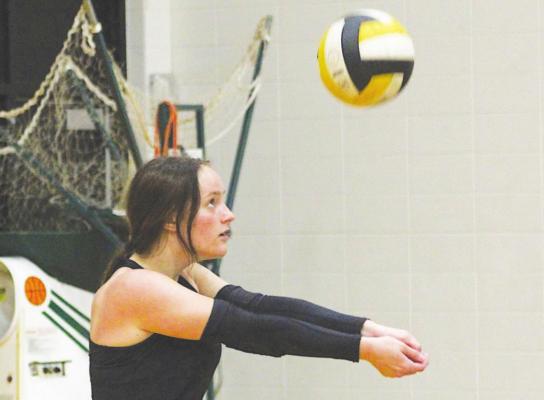 Kenna Killough settles under a hit during Monday’s afternoon session on the first day of practices at Sealy High School. COLE McNANNA on the first day of