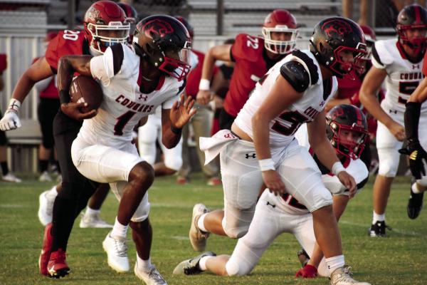 Jarvse Dickerson following his blockers for a big gain. COURTESY PHOTO