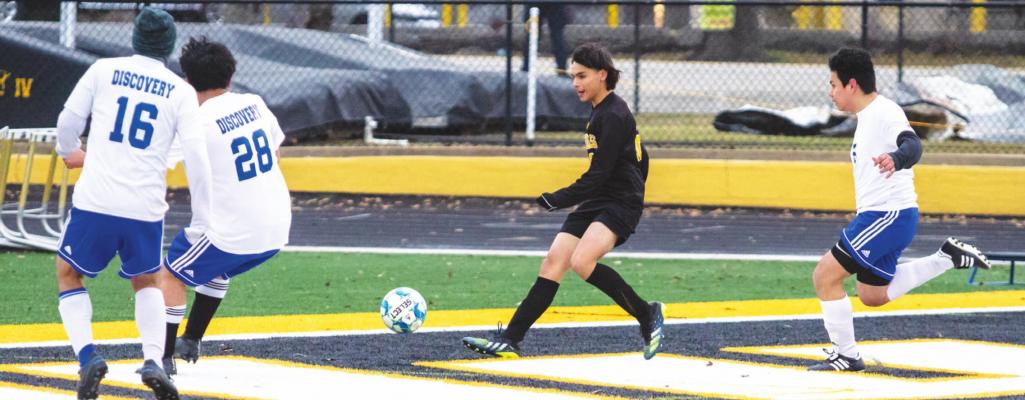 Sealy freshman Israel Santos fires a shot on net from in close during the Tigers’ District 20 tilt against Discovery last Friday at T.J. Mills Stadium. Santos scored the opening goal en route to a 5-0 win. COLE McNANNA