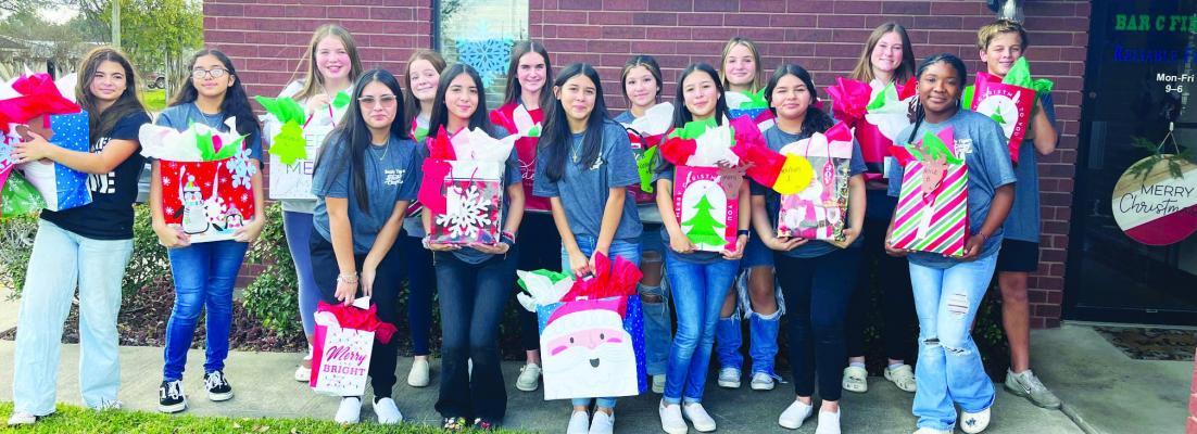 Last Friday, the Sealy Junior High Student Council dropped off their gifts for the Angel tree at The Sealy News office. The Angel Tree is a sponsoring program where gifts are handed out at Silverlake and the Oaks retirement communities. COURTESY PHOTO