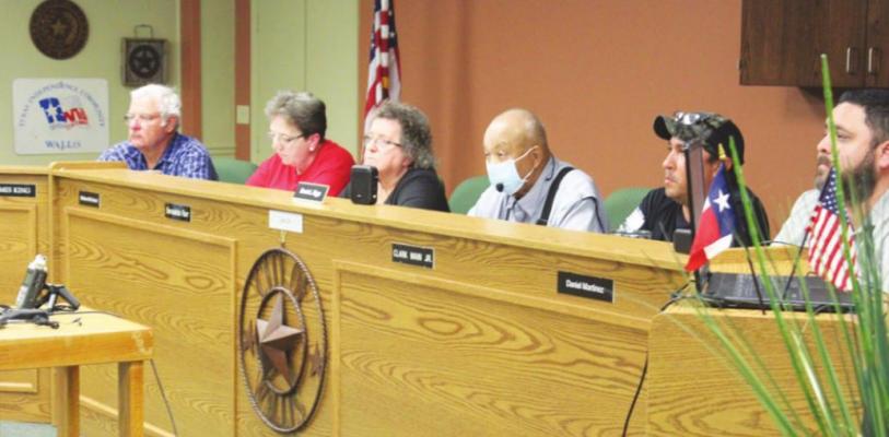 James King, Bernadette Parr, Melissa McFarland, Dennis Diggs, Clark Main Jr., and Daniel Martinez met Wednesday, Aug. 25 to approve the city’s budget at the Wallis City Hall Council Chambers. HANS LAMMEMAN