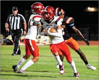 Brazos’ Matthew Reyes-Garza looks for running room against Van Vleck.