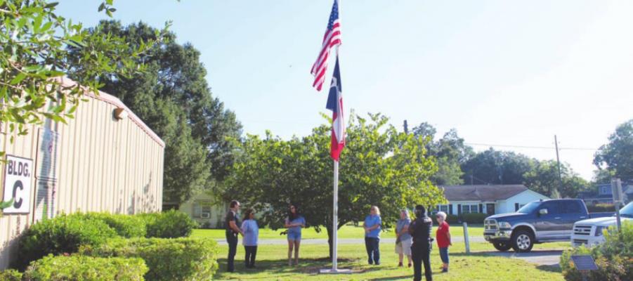 Locals pledged allegiance to the flag and shared their stories about how they heard of the terrorist attacks on the World Trade Center that fateful Tuesday 20 years ago and discussed the importance of the anniversary. HANS LAMMEMAN