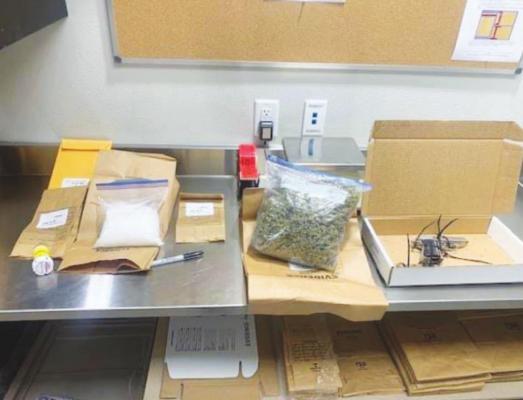 The Austin County Sheriff’s Office seized multiple drugs and a stolen handgun after three individuals were arrested during a traffic stop Saturday morning, Dec. 4, in Wallis. CONTRIBUTED PHOTO
