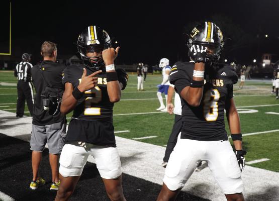 Elijah Sanders and AJ Cepon show off their football bling during last Friday’s runaway victory over Needville. Sealy has this week off to prepare for their battle of Austin County matchup with Bellville Oct. 11 at the Pasture of Pain. PHOTOS BY WILSON CHANEY