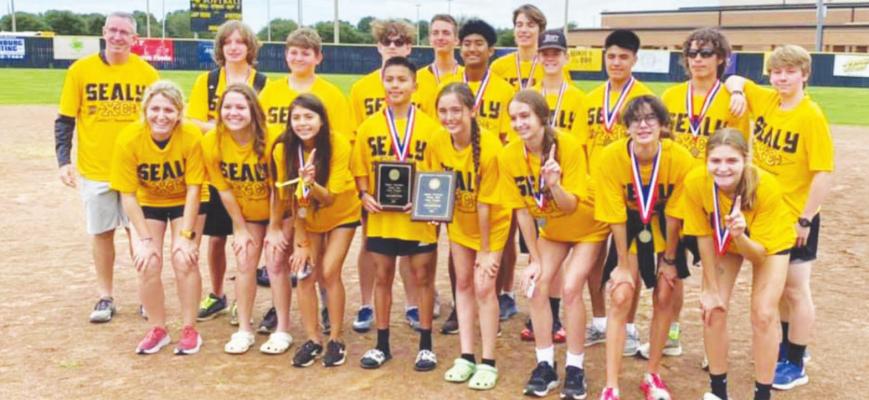 The Sealy Tiger cross country teams won both team competitions from the District Championship hosted in Sealy Monday. Pictured in the back row are head coach Anthony Branch, Mason Withrow, Tate Anderson, Kevin Culp, Ike Konvicka, Trevor Demei, Logan Eschenburg, Bryce Stanford, Xavier Olvera, Gavin Almaguer and Connor Smith. In the front row are assistant coach Danielle Eschenburg, Trinity Anderson, Allyson Guerrero, Fernando Garza, Haylie Eder, Annabelle Williams, Ria Torres and Blair Konesheck.