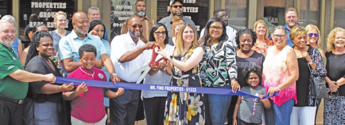 Mr. Find Properties ribbon cutting