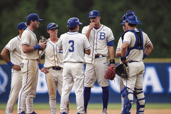 Above: Blinn’s Brok Eddy and Dusty Hart during a mound visit.