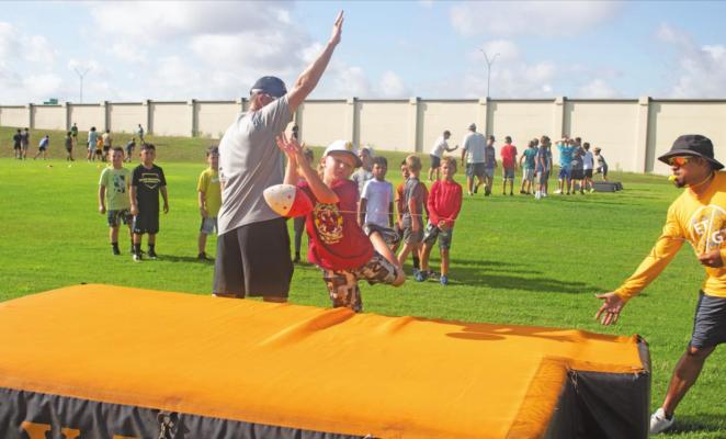 Tigers host football camp