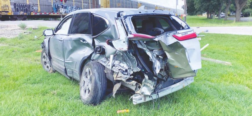 In fleeing the scene of his crime Sunday, Emmanuel Garcia’s car was struck by a train before his foot pursuit was cut short by Wallis Police Department’s Officer Mario Reyes. CONTRIBUTED PHOTOS