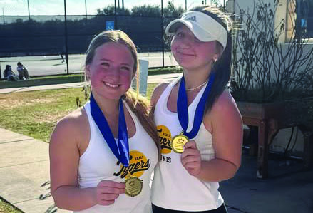 Emily Mock (left) and Hailey Svoboda show off their gold medals after winning the Girls Doubles bracket. COURTESY PHOTO