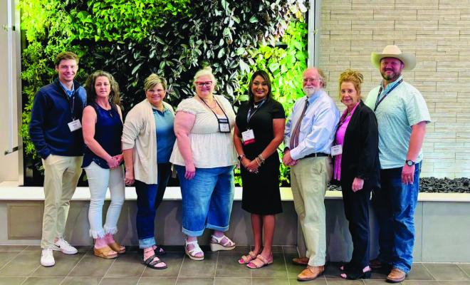 Congratulations to all Granite employees and freelancers for a job well done and for continuing the tradition of excellence our publications and products are known for. Pictured are the Granite delegates to this year's trade show and conference at the Denton Convention Center: Nick Adams (left), Tressa Alley, Jennifer Gray Richardson, Valeri Stair, Ana Cosino-Mize, Thomas Edwards, Marcy Branson and H. Daniel Philhower. PHOTO BY MIKE MIZE
