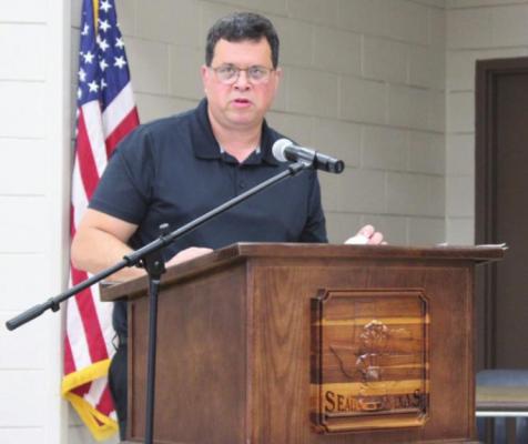 City Manager Warren Escovy speaks during the Aug. 19 meeting of the Sealy City Council at the W. E. Hill Community Center. HANS LAMMEMAN