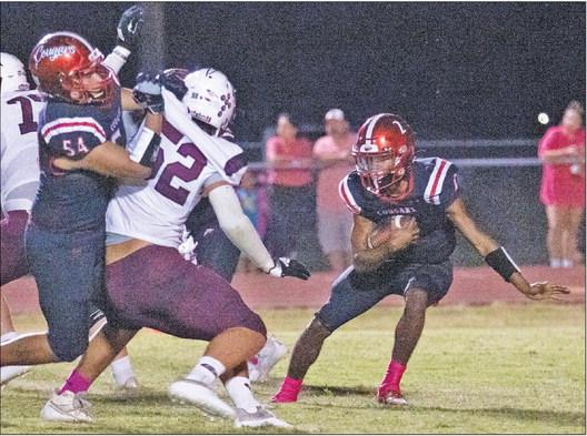 Brazos senior quarterback Jarvse Dickerson is a key player for the Cougars offensive attack. PHOTOS BY JIMMY GALVAN