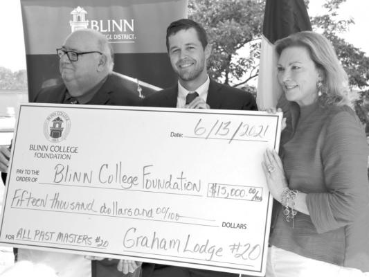 Michael R. Thorpe (left), Worshipful Master of Graham Masonic Lodge in Brenham, presents a $15,000 check to Sam Sommer (center), Chair of the Blinn College Foundation Board of Directors and Susan Myers, Executive Director of the Foundation. This is the fourth endowed scholarship gifted Blinn by the Masonic Lodge. CONTRIBUTED PHOTO