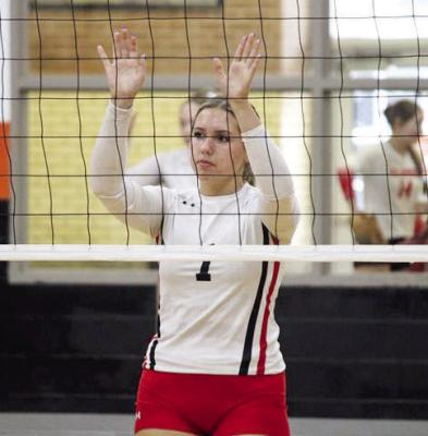 Rylea Roecker has her hands up and ready to defend the net for the Cougarettes. SEALY NEWS | EVAN HALE
